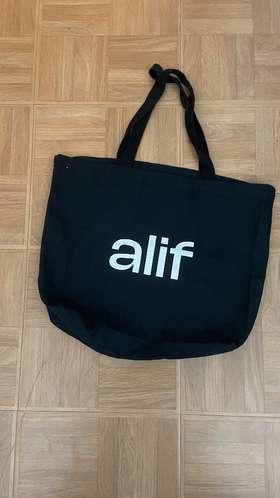 Black canvas alif tote bag